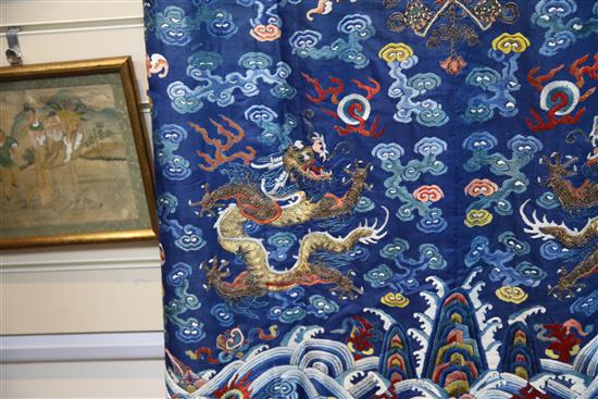 A Chinese blue satin embroidered silk and metal thread dragon robe, Jifu, late 19th / early 20th century,